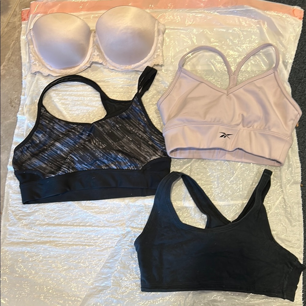 Reebok women’s black sports bra ,and various sports bras ,white wonder bra 34A